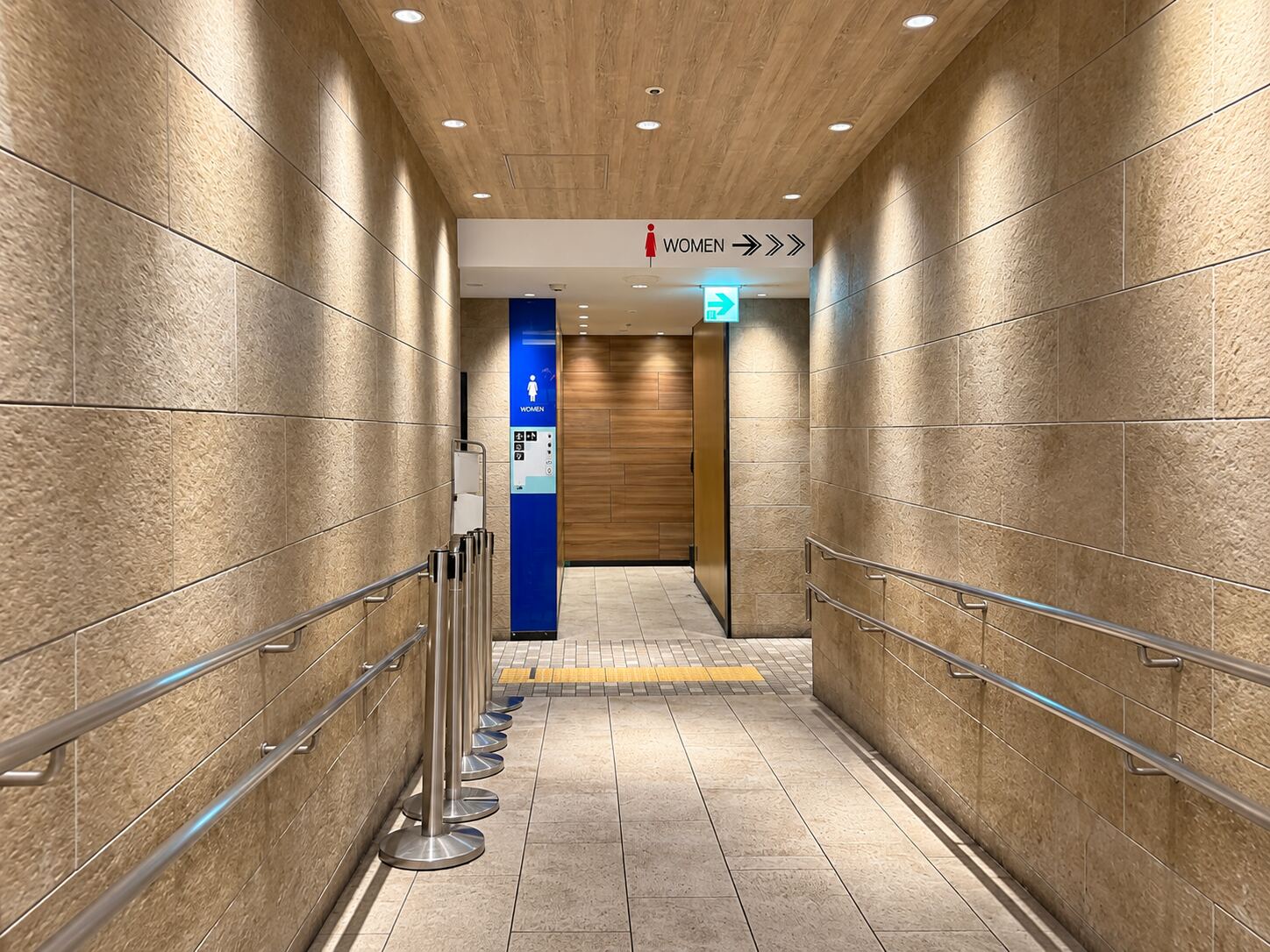 Accessible toilet with wheelchair, baby-seat and ostomate pictograms on Umaimon Street, near the Taikodori side of Nagoya Station.
